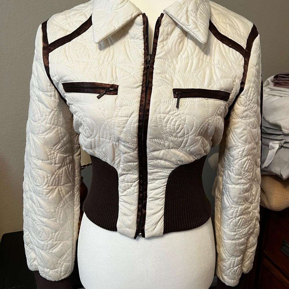 Beige with brown accent jacket.